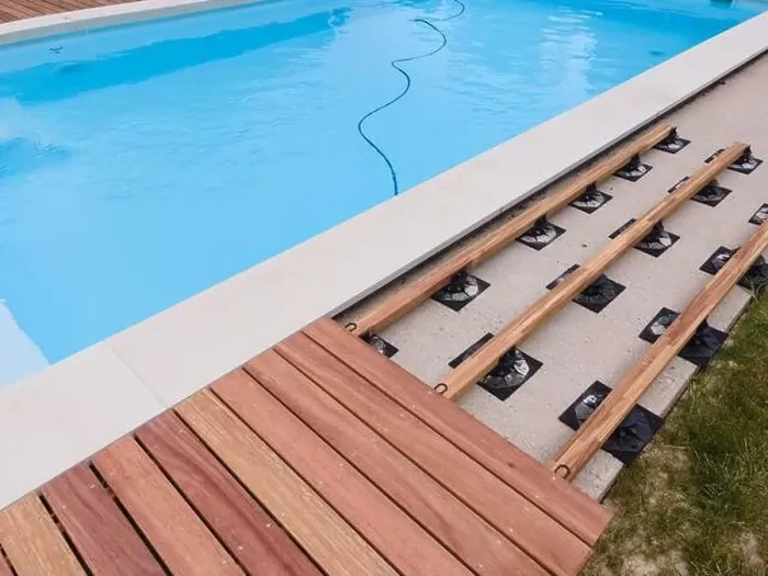 Framed Print : aerial drone flight over beautiful green garden with pool and the wooden deck of the pool is in progress Framed Print : aerial drone flight over beautiful green garden with pool and the wooden deck of the pool is in progress