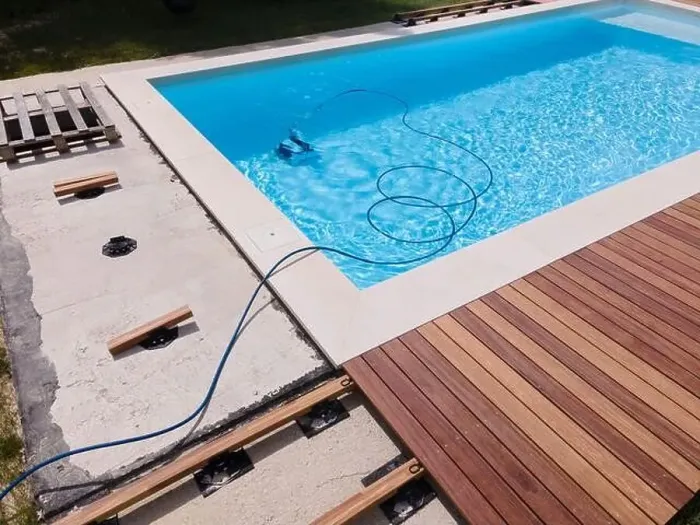 Framed Print : aerial drone flight over beautiful green garden with pool and the wooden deck of the pool is in progress Framed Print : aerial drone flight over beautiful green garden with pool and the wooden deck of the pool is in progress