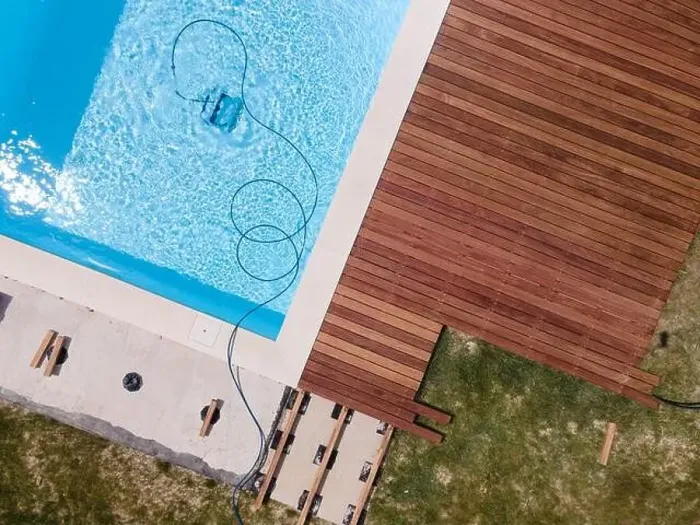 Framed Print : aerial drone flight over beautiful green garden with pool and the wooden deck of the pool is in progress Framed Print : aerial drone flight over beautiful green garden with pool and the wooden deck of the pool is in progress