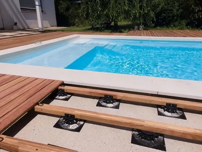 Framed Print : aerial drone flight over beautiful green garden with pool and the wooden deck of the pool is in progress Framed Print : aerial drone flight over beautiful green garden with pool and the wooden deck of the pool is in progress