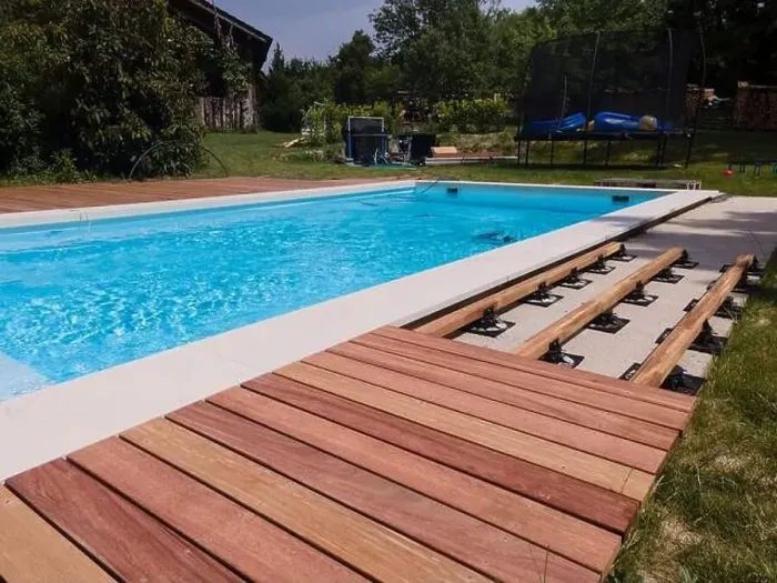Framed Print : aerial drone flight over beautiful green garden with pool and the wooden deck of the pool is in progress Framed Print : aerial drone flight over beautiful green garden with pool and the wooden deck of the pool is in progress