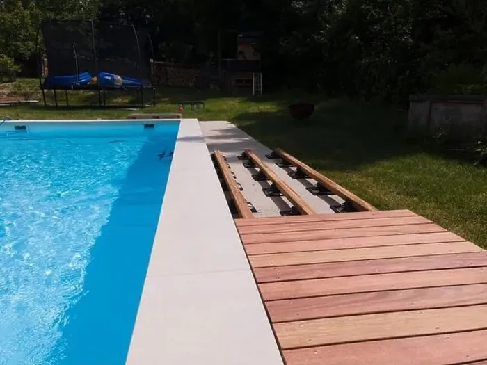 Framed Print : aerial drone flight over beautiful green garden with pool and the wooden deck of the pool is in progress Framed Print : aerial drone flight over beautiful green garden with pool and the wooden deck of the pool is in progress