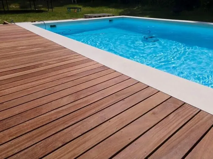 Framed Print : aerial drone flight over beautiful green garden with pool and the wooden deck of the pool is in progress Framed Print : aerial drone flight over beautiful green garden with pool and the wooden deck of the pool is in progress