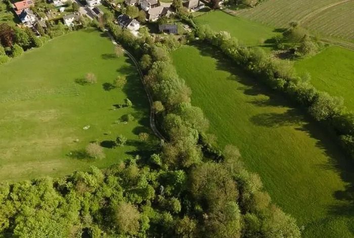 Framed Print : aerial drone flight over green meadows and forest in lower austria Framed Print : aerial drone flight over green meadows and forest in lower austria
