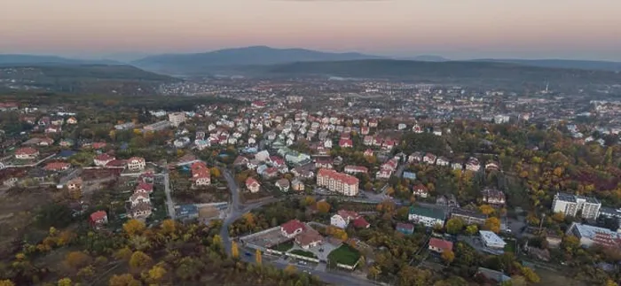 Framed Print : Aerial drone image of the cityscape of Uzhhorod Ukraine during sunset high mountains during sunset Framed Print : Aerial drone image of the cityscape of Uzhhorod Ukraine during sunset high mountains during sunset