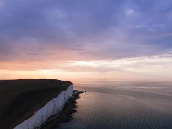 Framed Print : Aerial Drone Landscape photo of a Beachy Head Lighthouse and chalk cliffs at colorful sunrise with low tide in England Framed Print : Aerial Drone Landscape photo of a Beachy Head Lighthouse and chalk cliffs at colorful sunrise with low tide in England