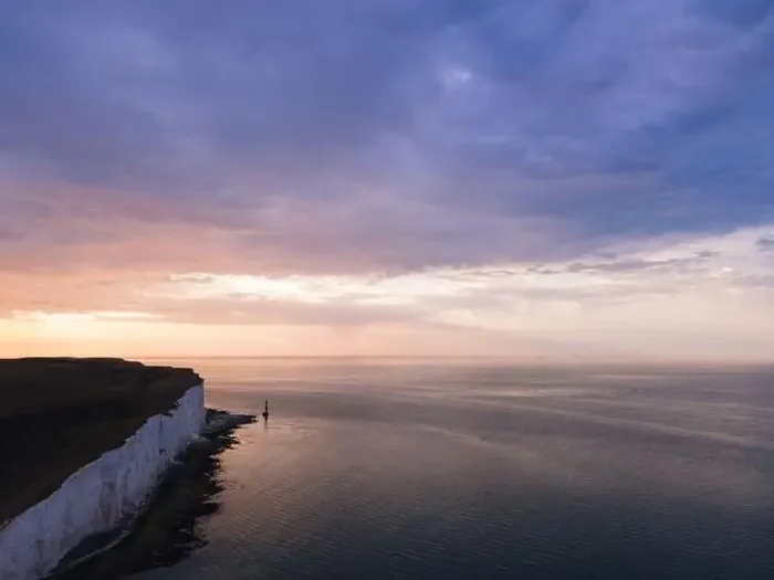 Framed Print : Aerial Drone Landscape photo of a Beachy Head Lighthouse and chalk cliffs at colorful sunrise with low tide in England Framed Print : Aerial Drone Landscape photo of a Beachy Head Lighthouse and chalk cliffs at colorful sunrise with low tide in England