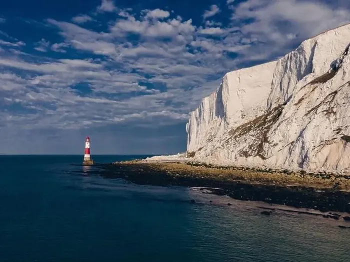 Framed Print : Aerial Drone Landscape photo of a Beachy Head Lighthouse and chalk cliffs at colorful sunrise with low tide in England Framed Print : Aerial Drone Landscape photo of a Beachy Head Lighthouse and chalk cliffs at colorful sunrise with low tide in England