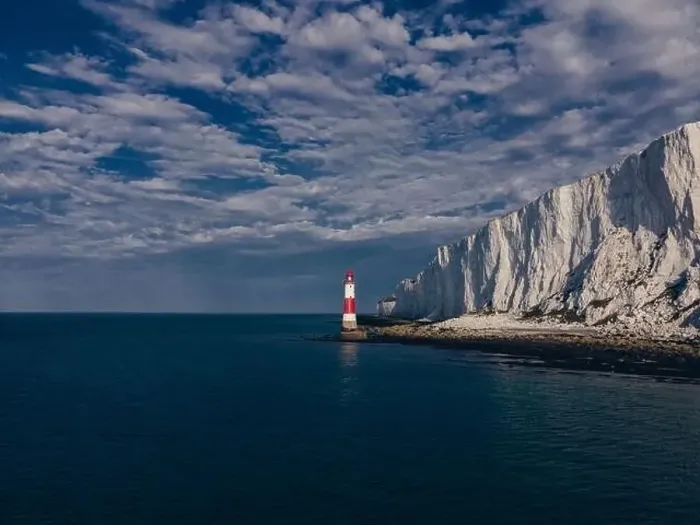 Framed Print : Aerial Drone Landscape photo of a Beachy Head Lighthouse and chalk cliffs at colorful sunrise with low tide in England Framed Print : Aerial Drone Landscape photo of a Beachy Head Lighthouse and chalk cliffs at colorful sunrise with low tide in England
