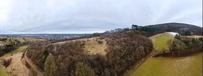Framed Print : aerial drone panorama of green hills with a little snow in Lower Austria at the edge of the Vienna Woods near Vienna Framed Print : aerial drone panorama of green hills with a little snow in Lower Austria at the edge of the Vienna Woods near Vienna