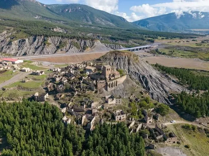 Framed Print : Aerial drone photo of the abandoned ghost town named Esco. Esco is located next to lake Aragon in Northern Spain Framed Print : Aerial drone photo of the abandoned ghost town named Esco. Esco is located next to lake Aragon in Northern Spain