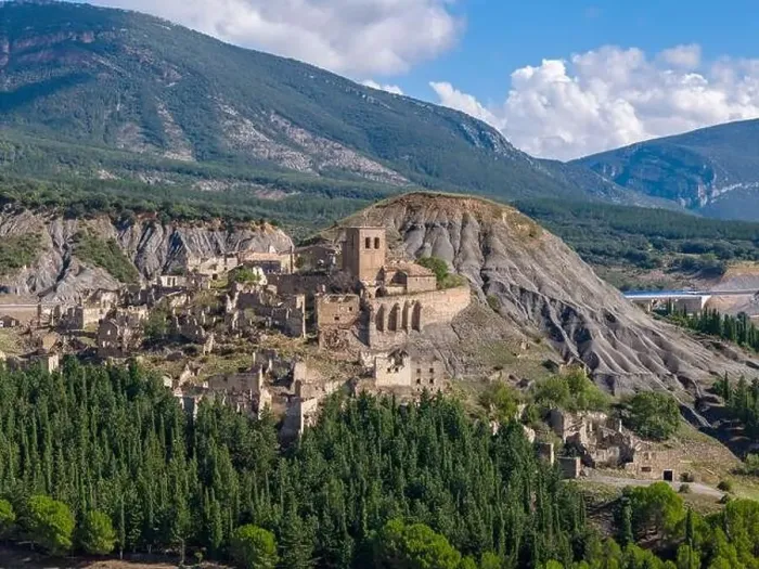 Framed Print : Aerial drone photo of the abandoned ghost town named Esco. Esco is located next to lake Aragon in Northern Spain Framed Print : Aerial drone photo of the abandoned ghost town named Esco. Esco is located next to lake Aragon in Northern Spain