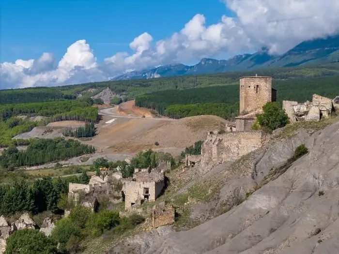 Framed Print : Aerial drone photo of the abandoned ghost town named Esco. Esco is located next to lake Aragon in Northern Spain Framed Print : Aerial drone photo of the abandoned ghost town named Esco. Esco is located next to lake Aragon in Northern Spain