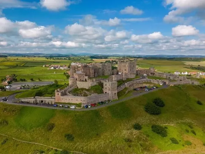 Framed Print : Aerial drone photo of Bamburgh Castle at the beautiful coastline of Northumberland