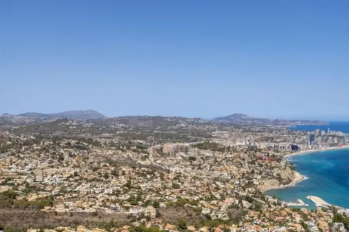 Framed Print : Aerial drone photo of the beautiful coastal town of Calp on Spain's Mediterranean coast showing an aerial drone view of Framed Print : Aerial drone photo of the beautiful coastal town of Calp on Spain's Mediterranean coast showing an aerial drone view of