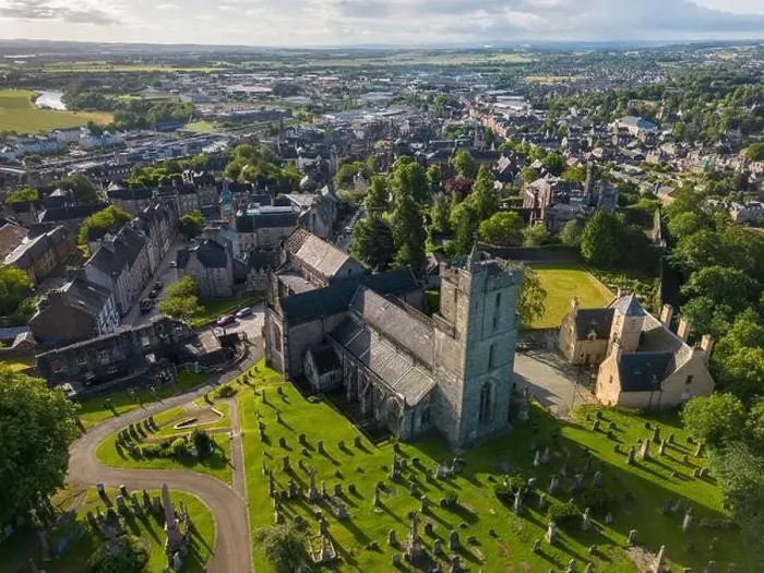 Framed Print : Aerial drone photo of the beautiful and old church in Stirling, Scotland. There is a large graveyard at the church Framed Print : Aerial drone photo of the beautiful and old church in Stirling, Scotland. There is a large graveyard at the church