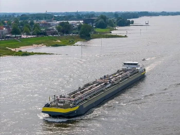 Framed Print : Aerial drone photo of a cargo ship on the river Waal in the Netherlands Framed Print : Aerial drone photo of a cargo ship on the river Waal in the Netherlands