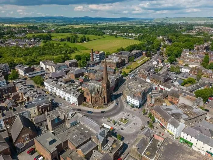 Framed Print : Aerial drone photo of the city centre of Dumfries in Scotland. There is a church located next to a town square Framed Print : Aerial drone photo of the city centre of Dumfries in Scotland. There is a church located next to a town square
