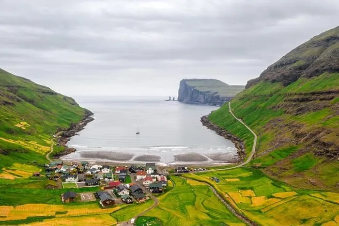 Framed Print : Aerial drone photo flying over Tjornuvik beach on Streymoy island, Faroe Islands, Denmark. Landscape photography Framed Print : Aerial drone photo flying over Tjornuvik beach on Streymoy island, Faroe Islands, Denmark. Landscape photography