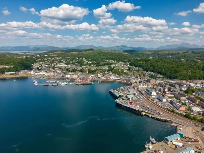 Framed Print : Aerial drone photo of the harbour town Oban in Scotland. It has a large ferry port and an old town centre at the bay
