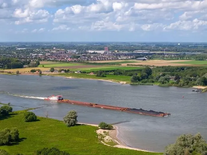 Framed Print : Aerial drone photo of a large cargo barge sailing on the river Waal in the Netherlans Framed Print : Aerial drone photo of a large cargo barge sailing on the river Waal in the Netherlans
