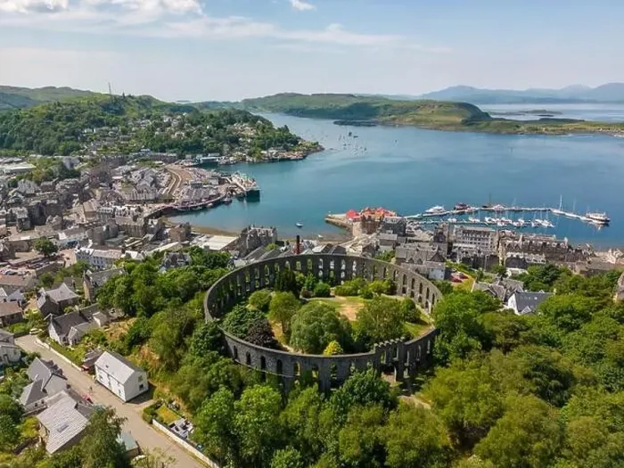 Framed Print : An aerial drone photo of the Mccaig's tower in Oban with a beautiful view over town and the bay Framed Print : An aerial drone photo of the Mccaig's tower in Oban with a beautiful view over town and the bay