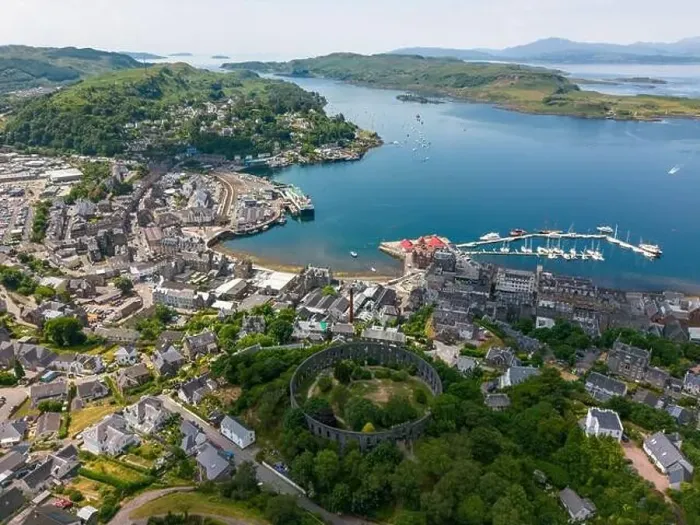 Framed Print : An aerial drone photo of the Mccaig's tower in Oban with a beautiful view over town and the bay Framed Print : An aerial drone photo of the Mccaig's tower in Oban with a beautiful view over town and the bay