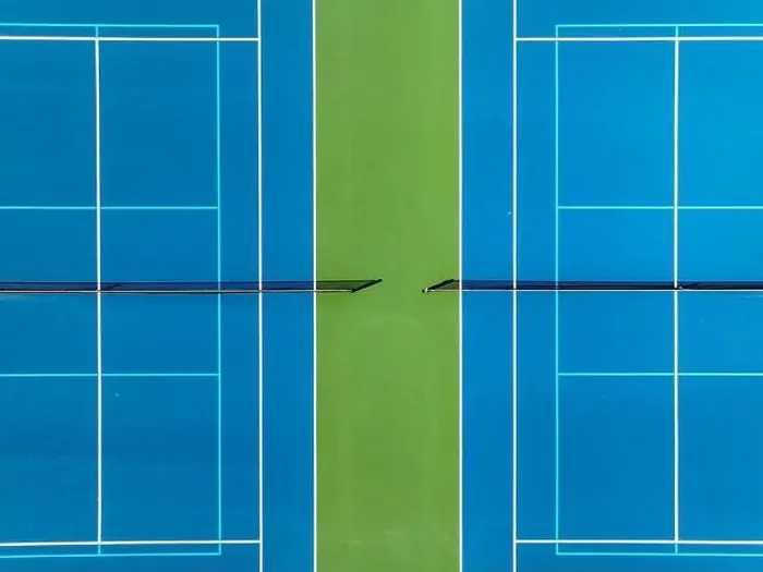 Framed Print : Aerial, drone, photo of new outdoor blue tennis court with white lines combined with light blue pickleball lines Framed Print : Aerial, drone, photo of new outdoor blue tennis court with white lines combined with light blue pickleball lines