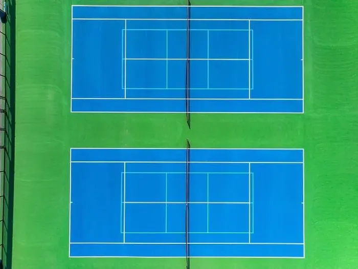 Framed Print : Aerial, drone, photo of new outdoor blue tennis court with white lines combined with light blue pickleball lines Framed Print : Aerial, drone, photo of new outdoor blue tennis court with white lines combined with light blue pickleball lines