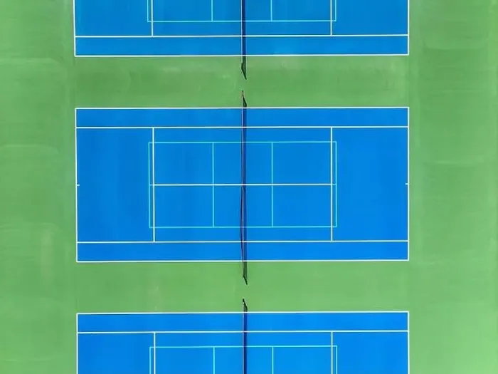 Framed Print : Aerial, drone, photo of new outdoor blue tennis court with white lines combined with light blue pickleball lines Framed Print : Aerial, drone, photo of new outdoor blue tennis court with white lines combined with light blue pickleball lines