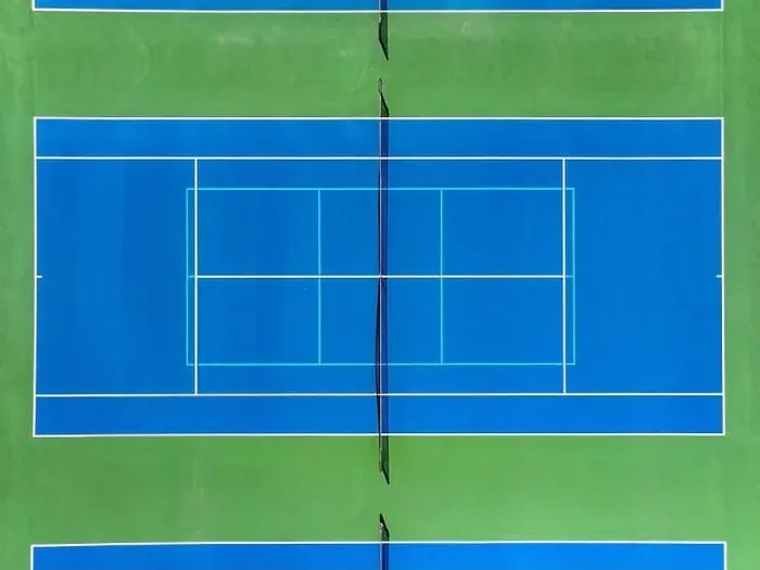 Framed Print : Aerial, drone, photo of new outdoor blue tennis court with white lines combined with light blue pickleball lines Framed Print : Aerial, drone, photo of new outdoor blue tennis court with white lines combined with light blue pickleball lines