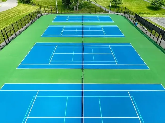 Framed Print : Aerial, drone, photo of new outdoor blue tennis court with white lines combined with light blue pickleball lines Framed Print : Aerial, drone, photo of new outdoor blue tennis court with white lines combined with light blue pickleball lines