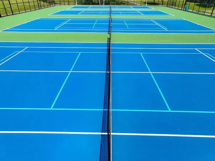 Framed Print : Aerial, drone, photo of new outdoor blue tennis court with white lines combined with light blue pickleball lines Framed Print : Aerial, drone, photo of new outdoor blue tennis court with white lines combined with light blue pickleball lines