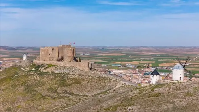 Framed Print : Aerial drone photo of the old windmills and castle in Consuegra, Spain Framed Print : Aerial drone photo of the old windmills and castle in Consuegra, Spain