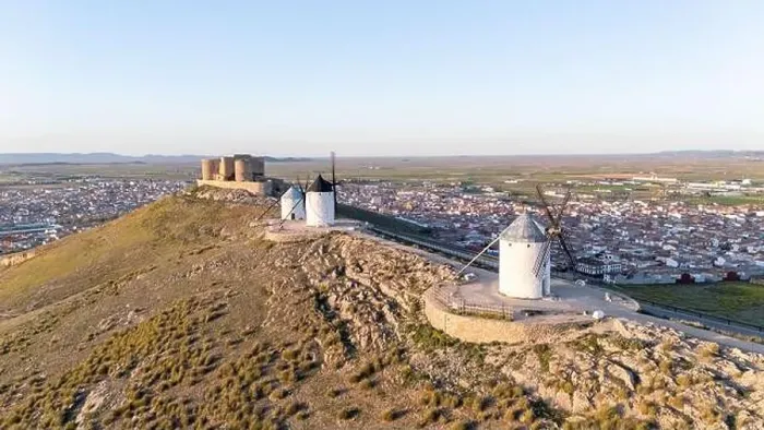 Framed Print : Aerial drone photo of the old windmills and castle in Consuegra, Spain Framed Print : Aerial drone photo of the old windmills and castle in Consuegra, Spain