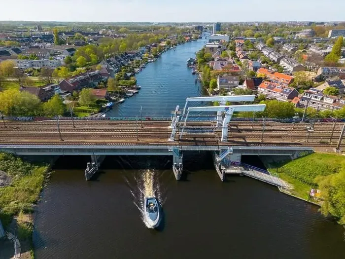 Framed Print : Aerial drone photo of a railway bridge. The bridge is named de Vink and is located in Leiden, the Netherlands Framed Print : Aerial drone photo of a railway bridge. The bridge is named de Vink and is located in Leiden, the Netherlands