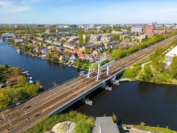 Framed Print : Aerial drone photo of a railway bridge. The bridge is named de Vink and is located in Leiden, the Netherlands Framed Print : Aerial drone photo of a railway bridge. The bridge is named de Vink and is located in Leiden, the Netherlands
