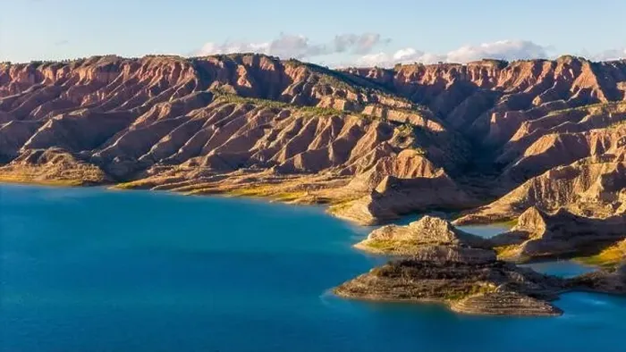 Framed Print : This aerial drone photo shows the lake Negratin in the Granada Geopark, Spain Framed Print : This aerial drone photo shows the lake Negratin in the Granada Geopark, Spain