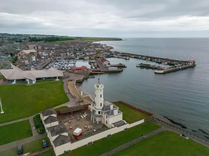 Framed Print : Aerial drone photo of the signal tower and harbour in Arbroath. Arbroath is a harbour town in Aberdeenshire, Scotland Framed Print : Aerial drone photo of the signal tower and harbour in Arbroath. Arbroath is a harbour town in Aberdeenshire, Scotland