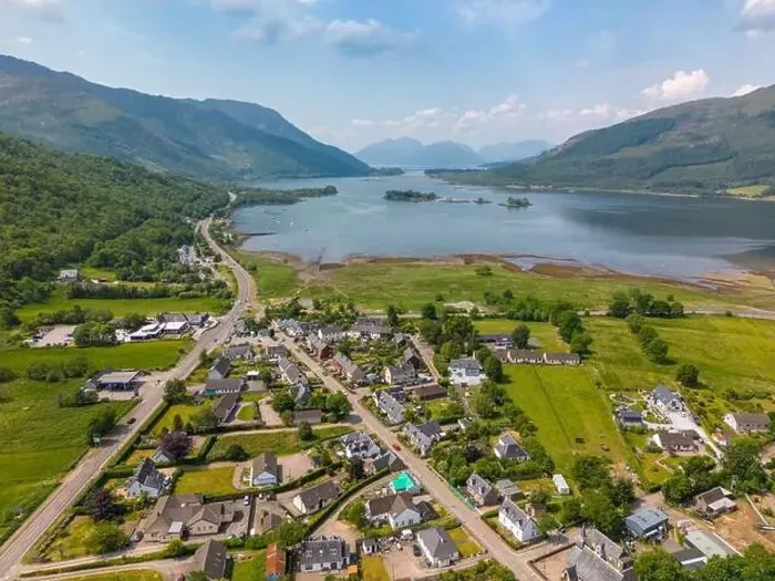 Framed Print : Aerial drone photo of the small village Glencoe. Glencoe is located between teh mountains of the Scottish Highlands