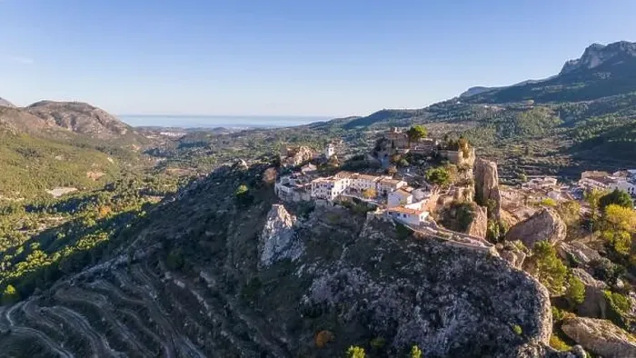 Framed Print : Aerial drone photo of the Spanish mountain town named El Castell de Guadalest Framed Print : Aerial drone photo of the Spanish mountain town named El Castell de Guadalest
