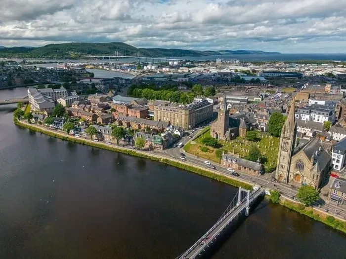 Framed Print : Aerial drone photo of the town centre and churches in Inverness next to the river Ness in Scotland Framed Print : Aerial drone photo of the town centre and churches in Inverness next to the river Ness in Scotland