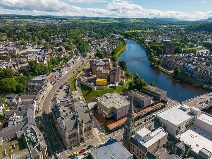 Framed Print : Aerial drone photo of the town centre and churches in Inverness next to the river Ness in Scotland Framed Print : Aerial drone photo of the town centre and churches in Inverness next to the river Ness in Scotland