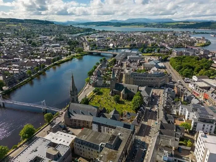 Framed Print : Aerial drone photo of the town centre and churches in Inverness next to the river Ness in Scotland Framed Print : Aerial drone photo of the town centre and churches in Inverness next to the river Ness in Scotland