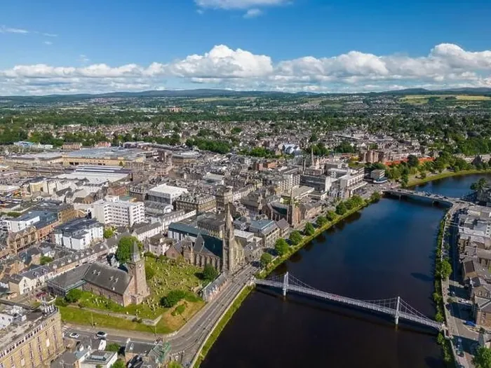 Framed Print : Aerial drone photo of the town centre and churches in Inverness next to the river Ness in Scotland Framed Print : Aerial drone photo of the town centre and churches in Inverness next to the river Ness in Scotland