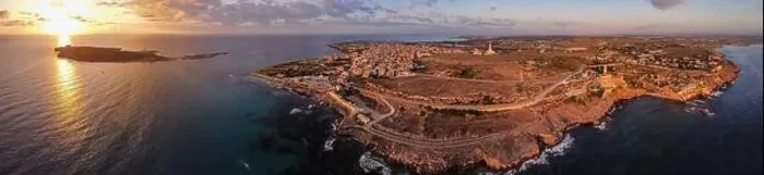 Framed Print : Aerial drone. Rocky coastline and island at Portopalo di Capo Passero, Siracusa Province, Sicily