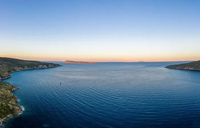 Framed Print : Aerial drone shot of Adriatic sea Bisevo island from Komiza Vis Island view in Croatia summer before sunrise Framed Print : Aerial drone shot of Adriatic sea Bisevo island from Komiza Vis Island view in Croatia summer before sunrise
