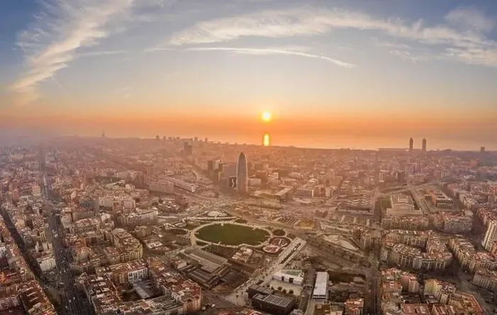 Framed Print : Aerial drone shot of agbar tower by Barcelona beach with sunrise Framed Print : Aerial drone shot of agbar tower by Barcelona beach with sunrise