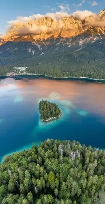 Framed Print : Aerial drone shot of Alpenglow with fog on Zugspitze by Eibsee lake in Germany Framed Print : Aerial drone shot of Alpenglow with fog on Zugspitze by Eibsee lake in Germany
