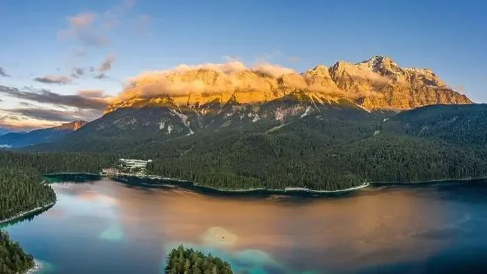 Framed Print : Aerial drone shot of Alpenglow with fog on Zugspitze by Eibsee lake in Germany